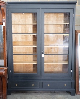 A French painted glazed pine two door bookcase, width 155cm, depth 27cm, height 211cm